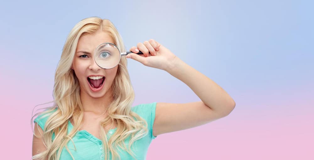 Women with magnifying glass